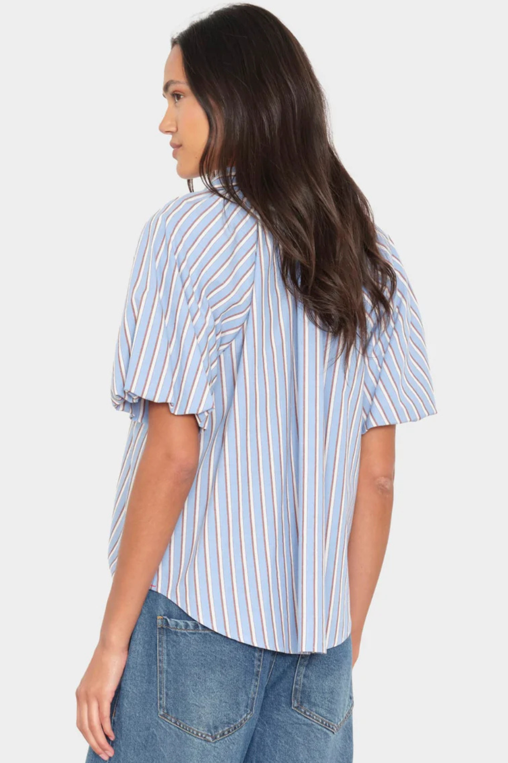 Model wearing Xirena Lyla Shirt Blue Cedar rear view