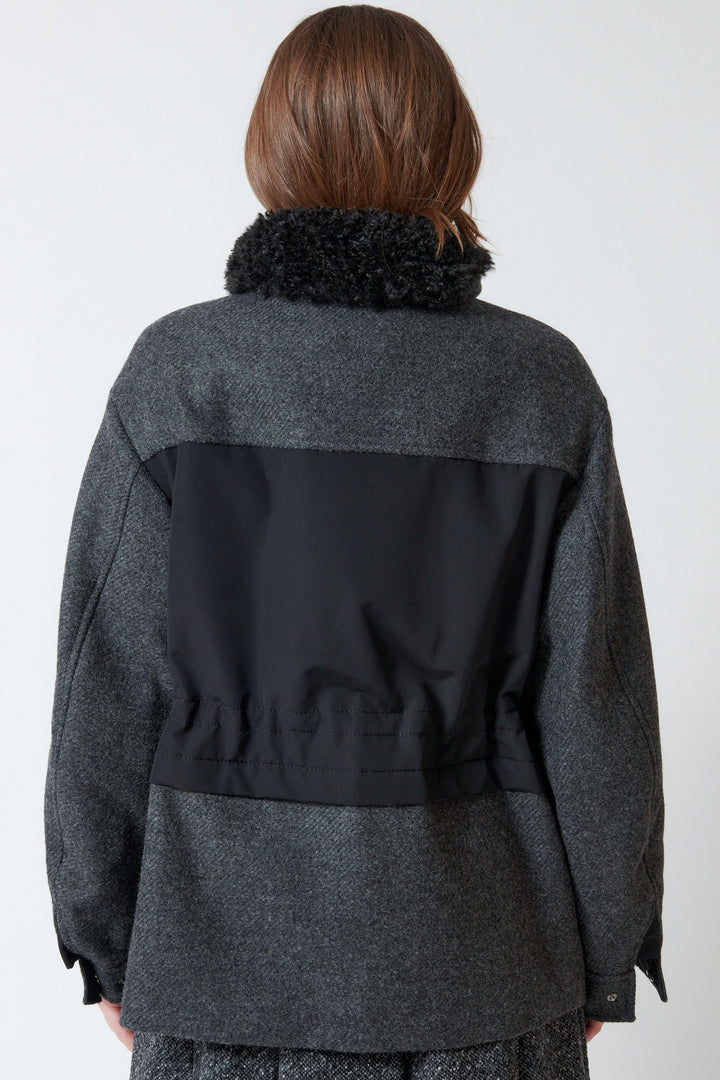 Model wearing Mantu Soft Wool Coat rear view