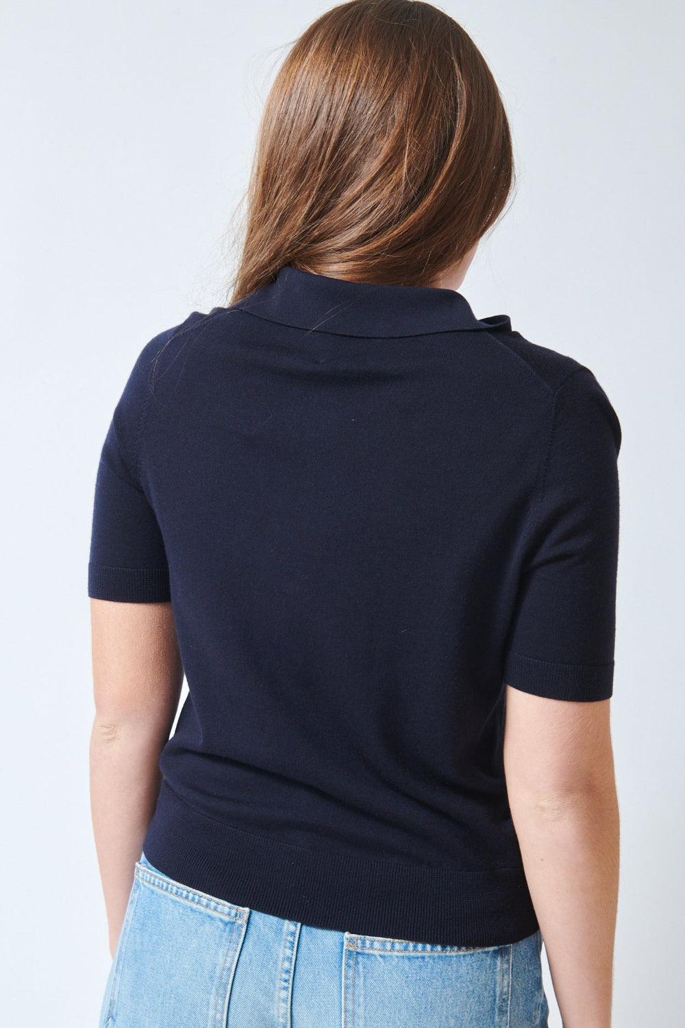 Julia wearing Allude Touch On Wool Quarter Sleeve Poloneck Sweater Dark Navy rear view