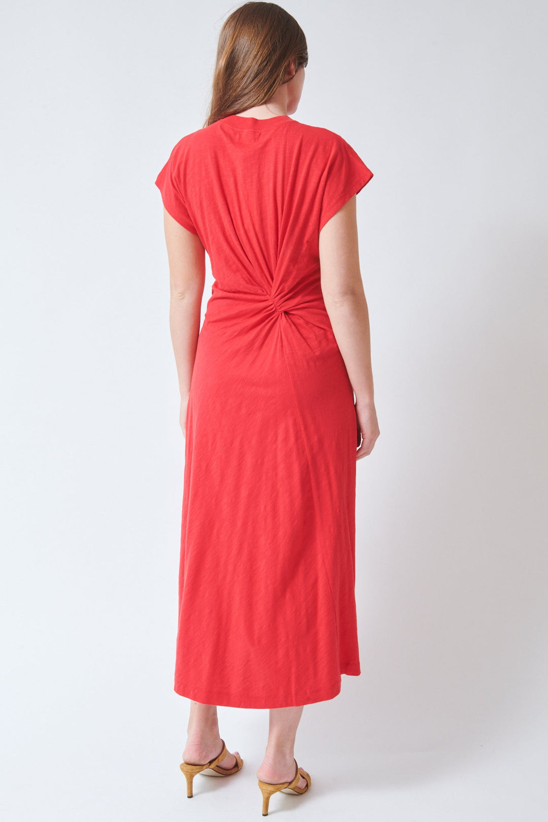 Julia wearing Apiece Apart Volta Twist Dress rear view