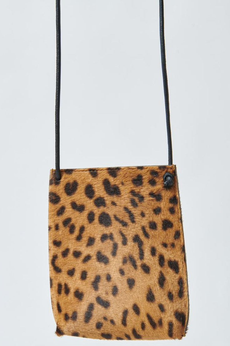 Model holding B.May Cell Pouch front close up view