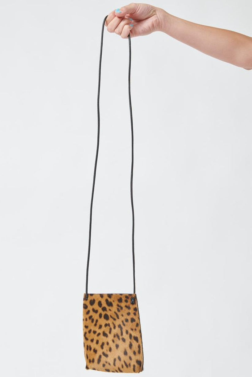 Model holding B.May Cell Pouch front view