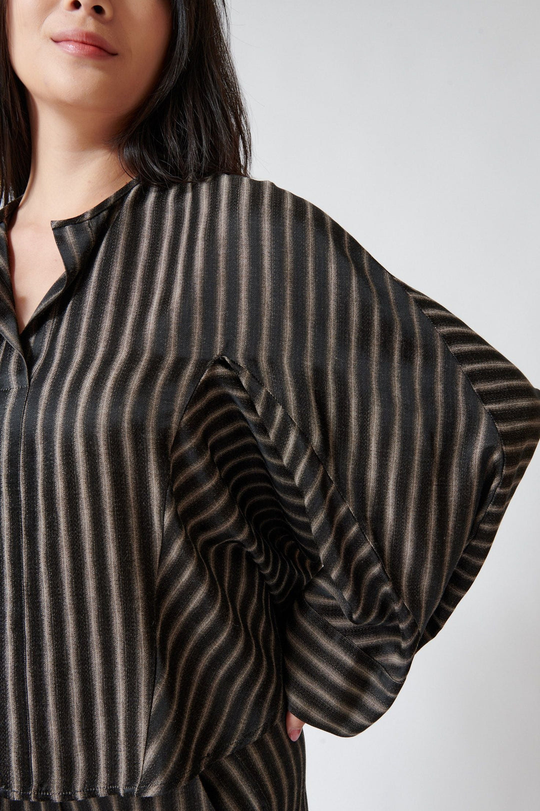 Lilly wearing Zero + Maria Cornejo Long Sleeve Blur Stripe Akeo Shirt Brown Black detail view