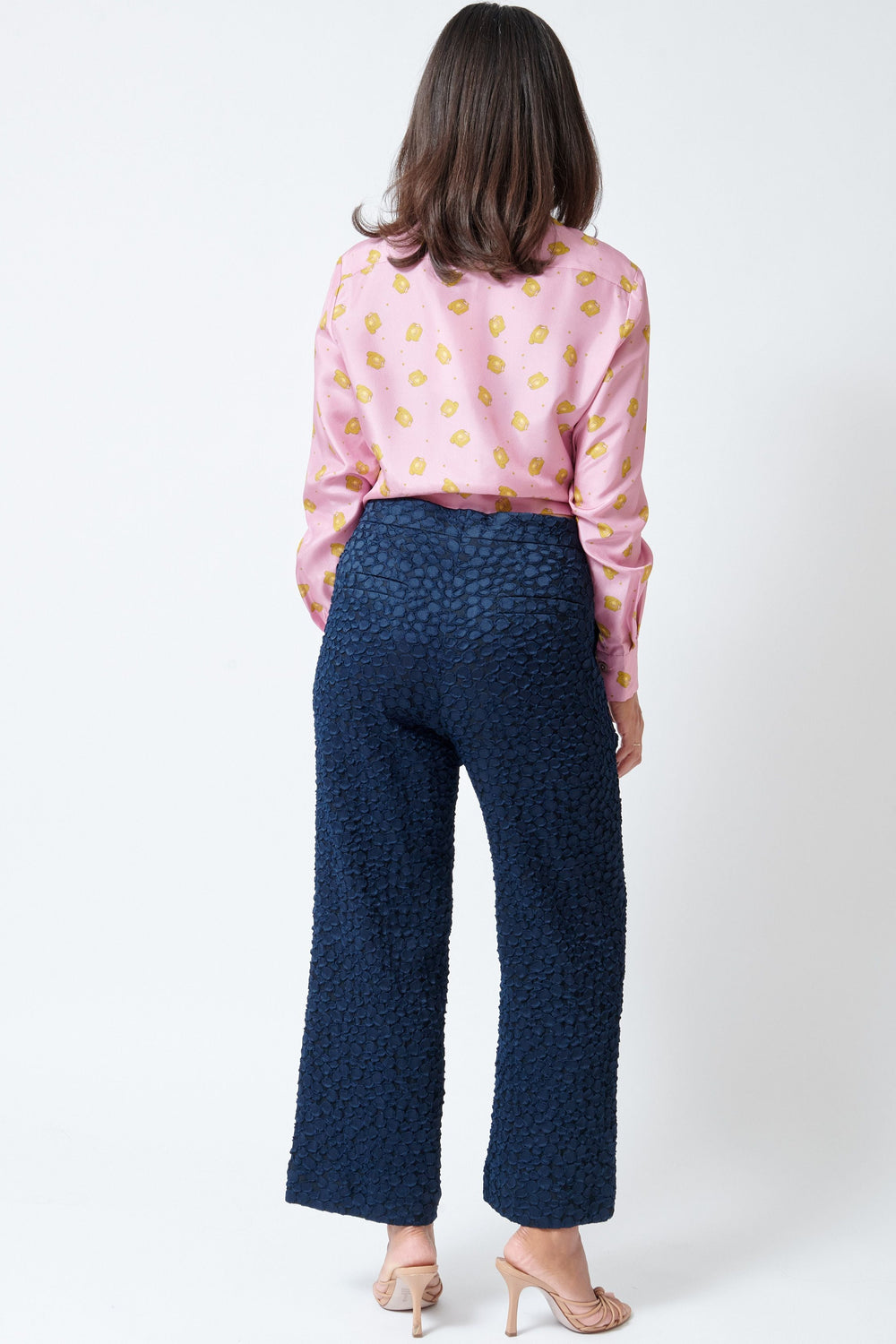 Model wearing Odeeh Tactile Fil Coupé Pants rear view