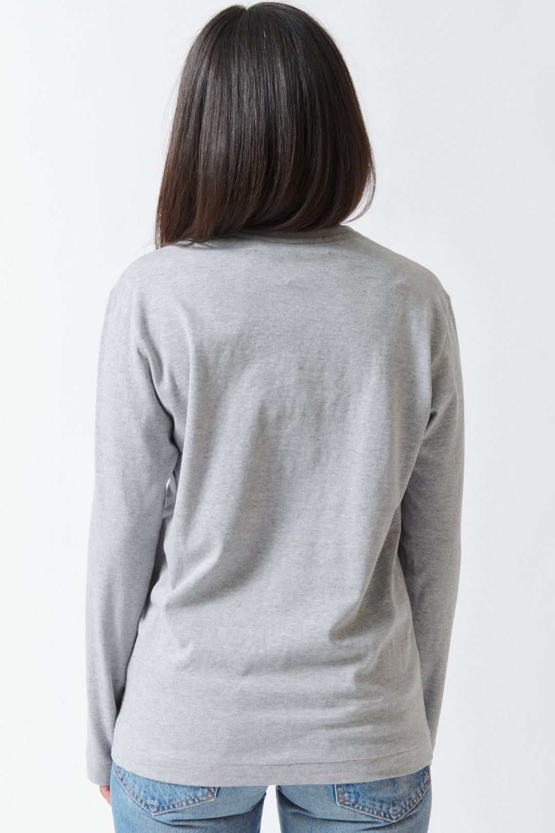 Amanda wearing Comme des Garçons PLAY Black Emblem Long Sleeve T Shirt Grey Black Heart rear view