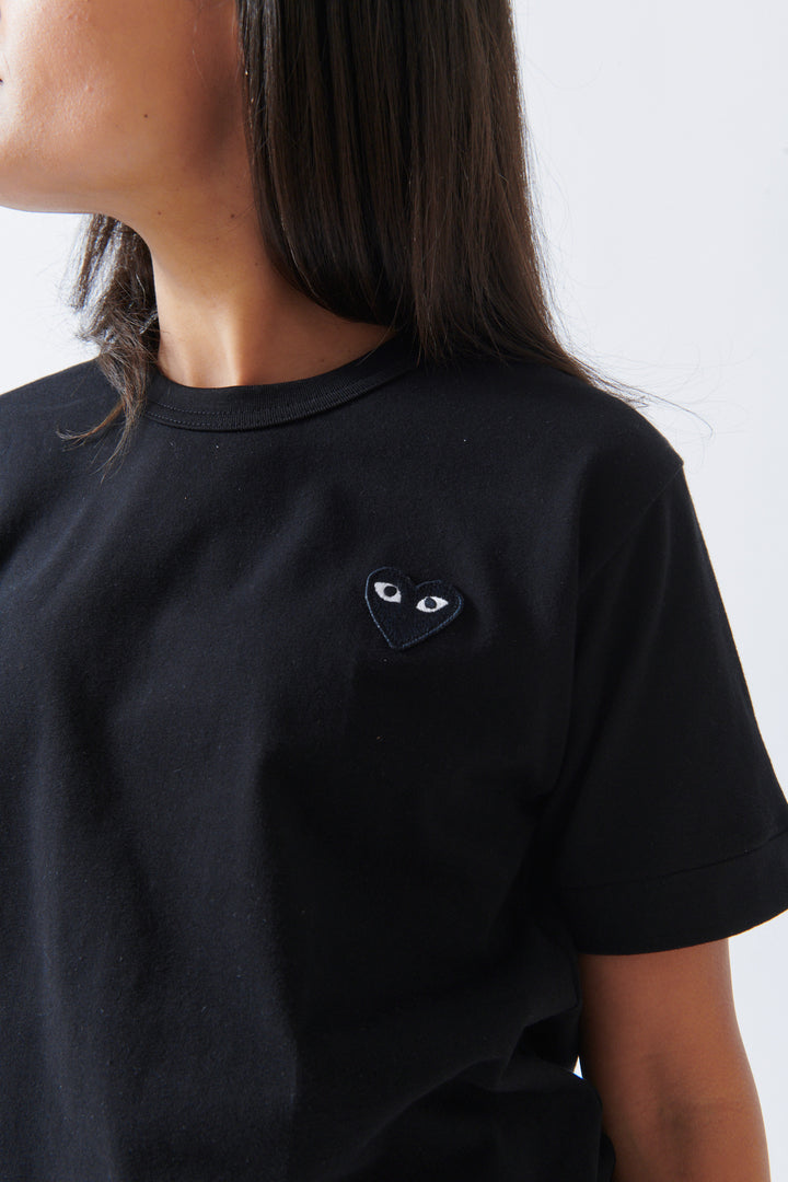 Amanda wearing Comme des Garçons PLAY Black Emblem T Shirt Black Black Heart front/detail view