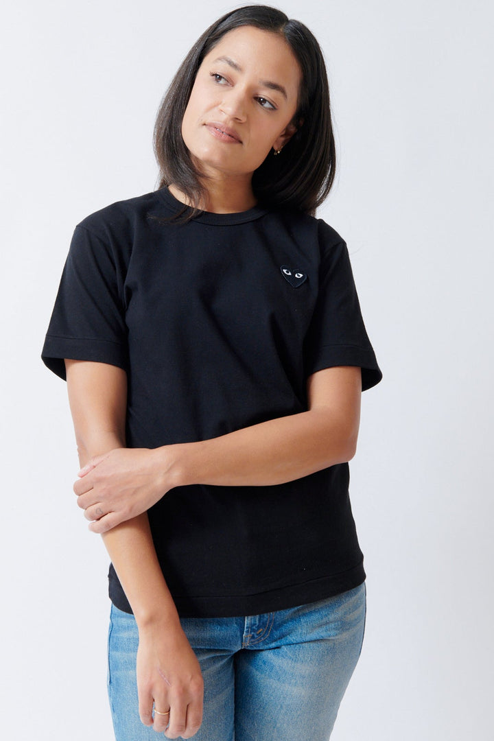 Amanda wearing Comme des Garçons PLAY Black Emblem T Shirt Black Black Heart front view