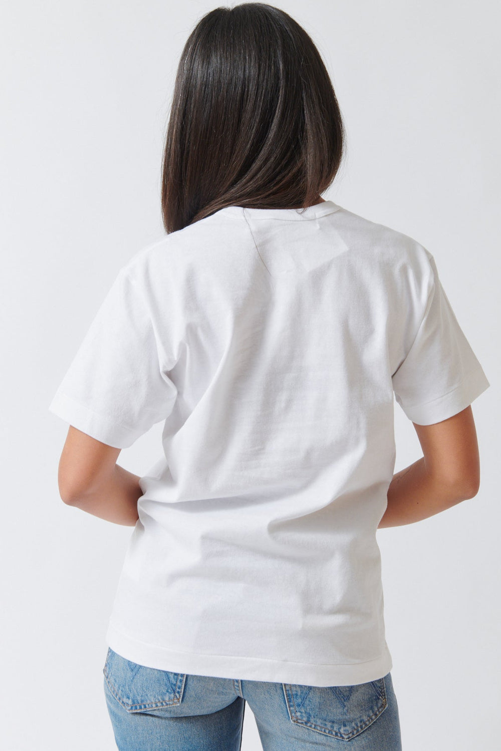 Amanda wearing Comme des Garçons PLAY Double Logo Print T Shirt White Black Hearts rear view