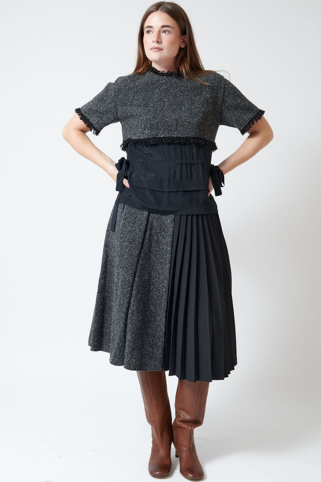 Model wearing Mantu Compact Tweed Wide Pleat Skirt front view