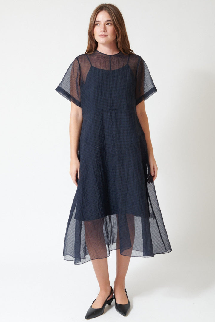 Julia wearing Fabiana Pigna Lumi Italian Techno Organza Dress in Midnight, alternate front view.