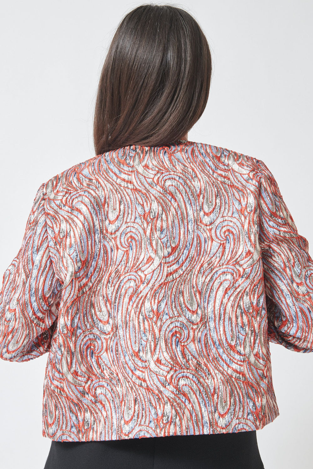Model wearing Odeeh Paisley Waves Jacket rear view