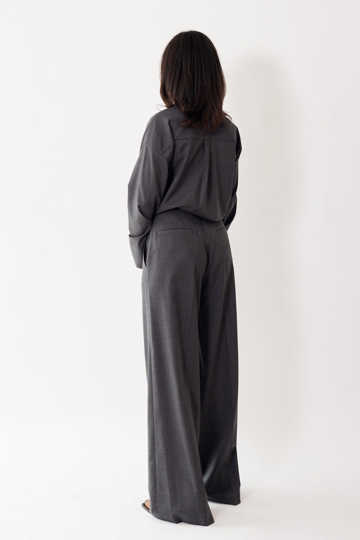 Amanda wearing Odeeh Virgin Wool Full Wide Leg Trouser rear view