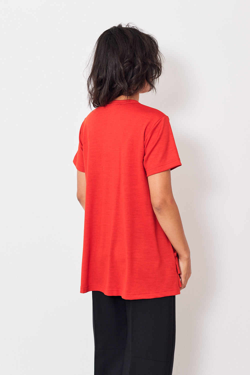Amanda wearing Comme des Garçons  Apron Front Wool Tee Shirt rear view