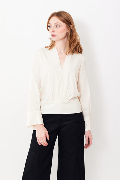 Waverly wearing Zero + Maria Cornejo L/S Sacha 25 Year Collection Silk Charmeuse Top front view