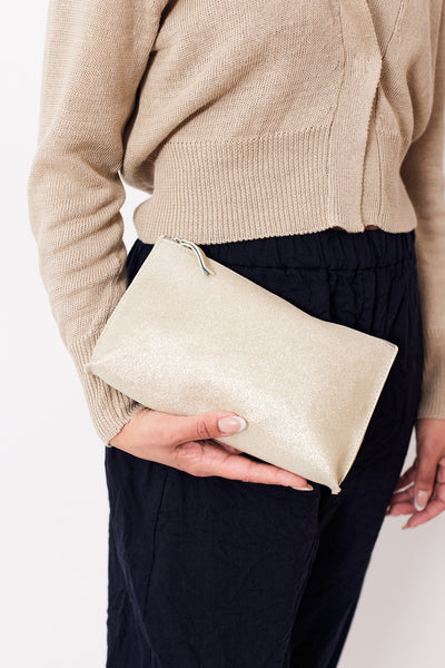 Amanda holding B. May Essential Pouch front view