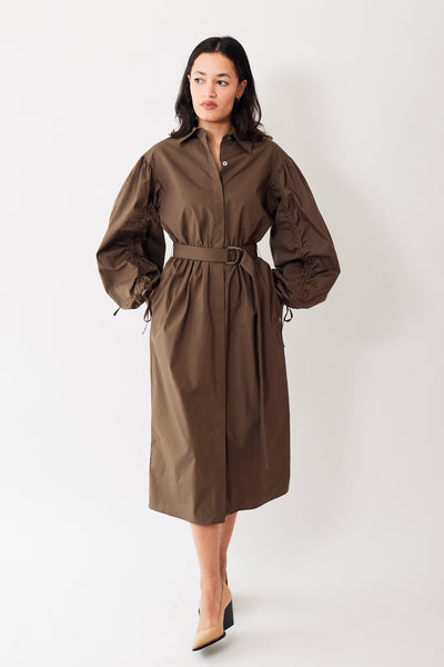 Amanda wearing Mantu Ruched Long Sleeve Belted Dress With Pockets front view