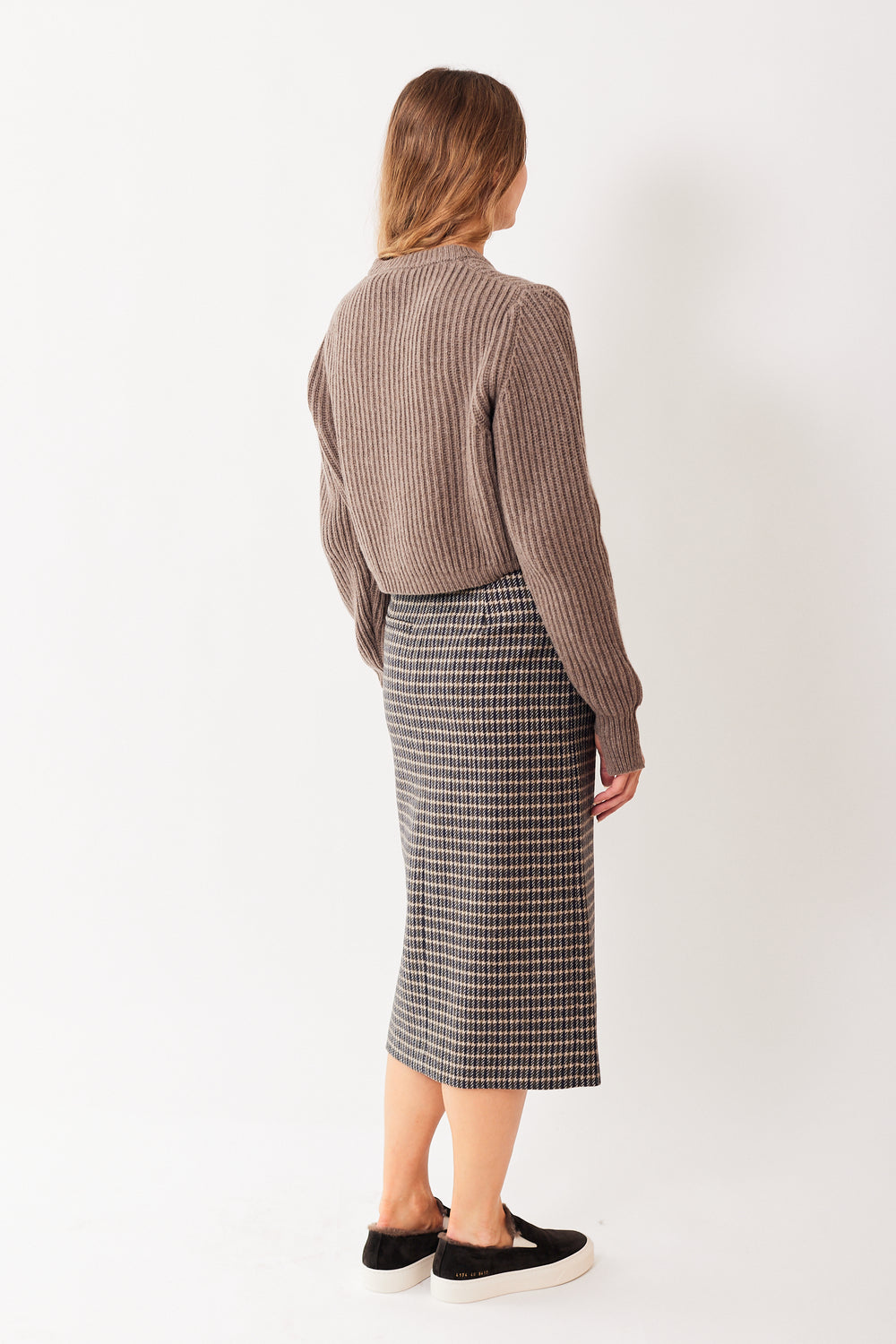Mari wearing Tela Sunday Skirt rear view