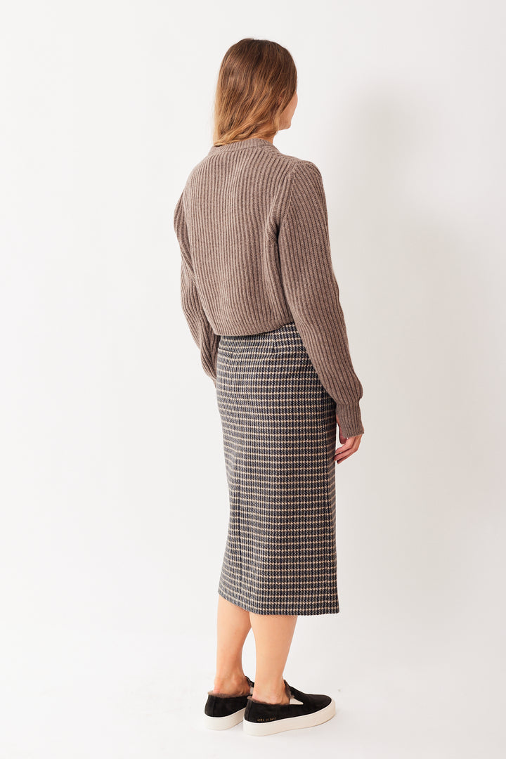 Mari wearing Tela Sunday Skirt rear view