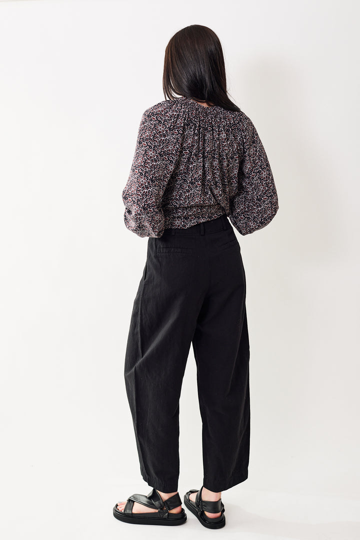Julia wearing Apiece Apart Bari Crop Trouser rear view