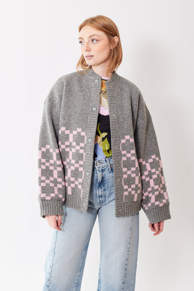 Front of Stine Goya Tino Padded Dry Heavy Knit Jacket in Grey Pink Graphic Check on model.