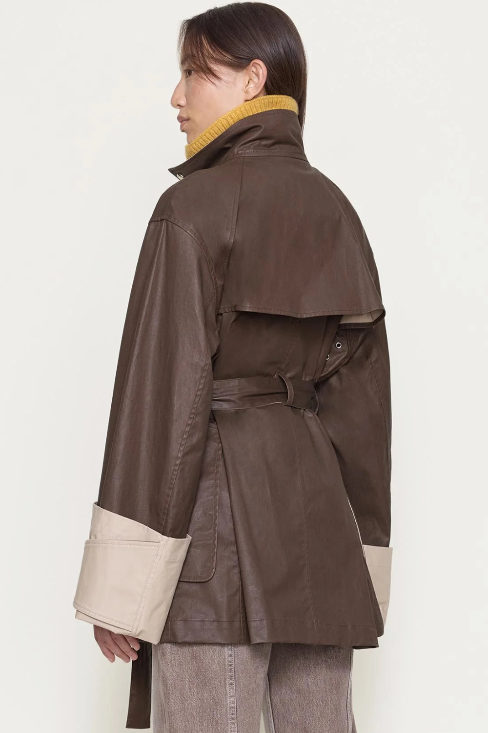 Model wearing OSSOU Asha Coat Tobacco Rye rear view