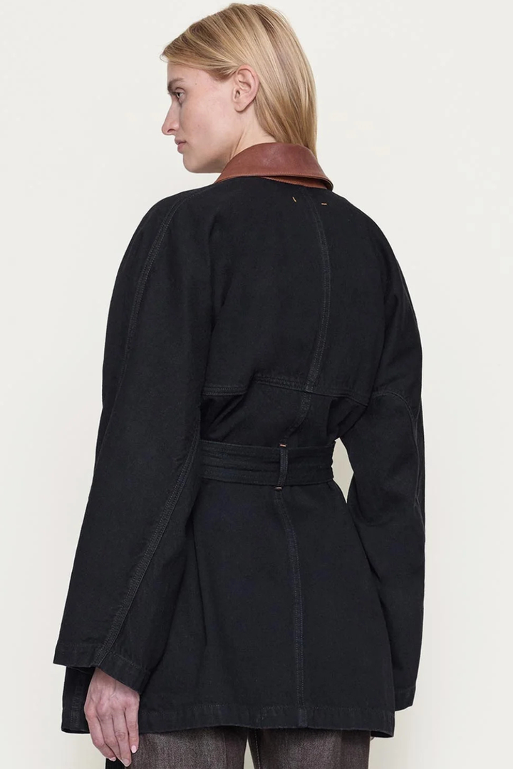 Model wearing OSSOU Sweep Coat Dusk Wash Tan Leather rear view