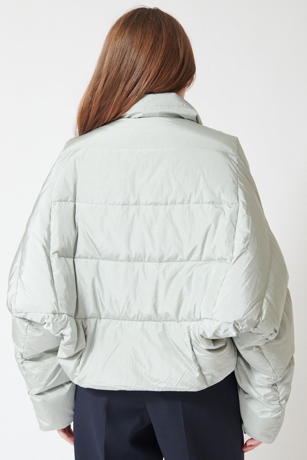 Julia wearing Christian Wijnants Jani Coat in Pigeon, rear view.