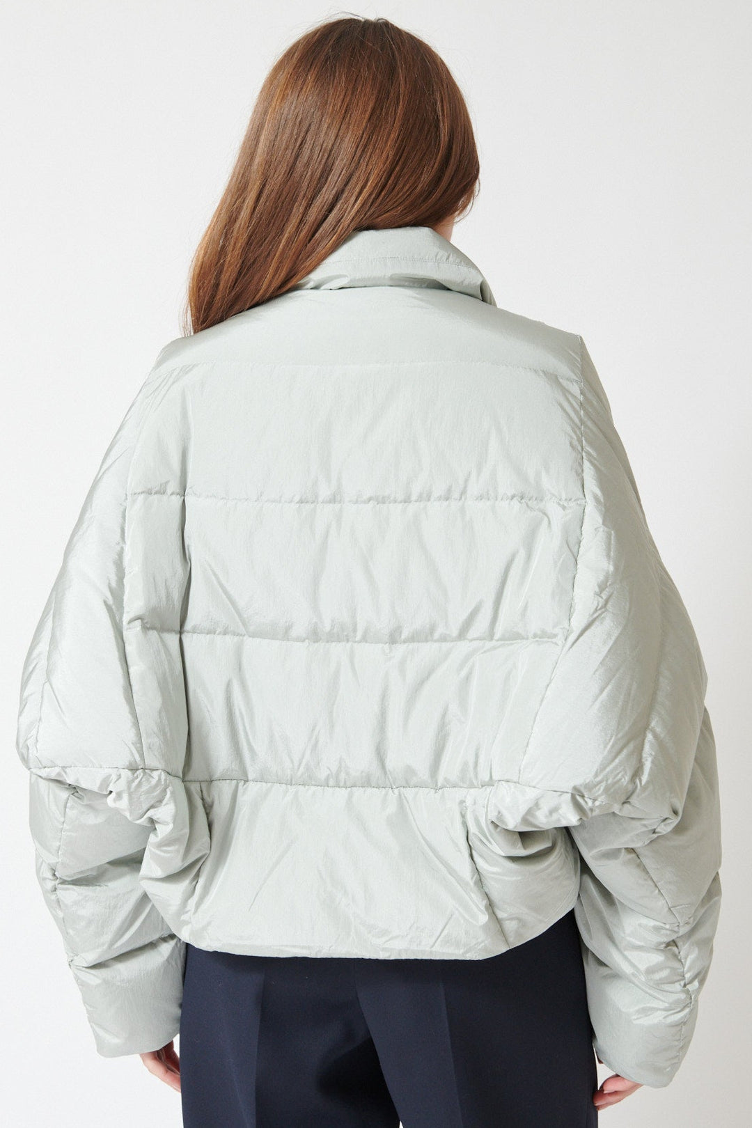 Julia wearing Christian Wijnants Jani Coat in Pigeon, rear view.