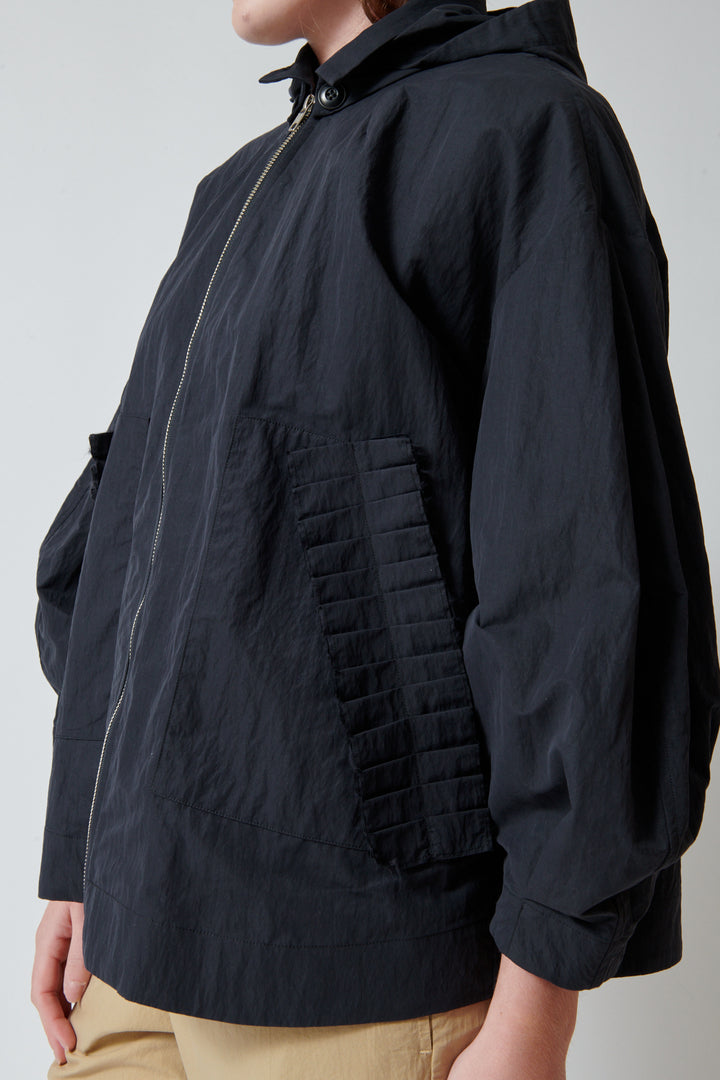 Julia wearing Fabiana Pigna Eleni Jacket Onyx front/side view