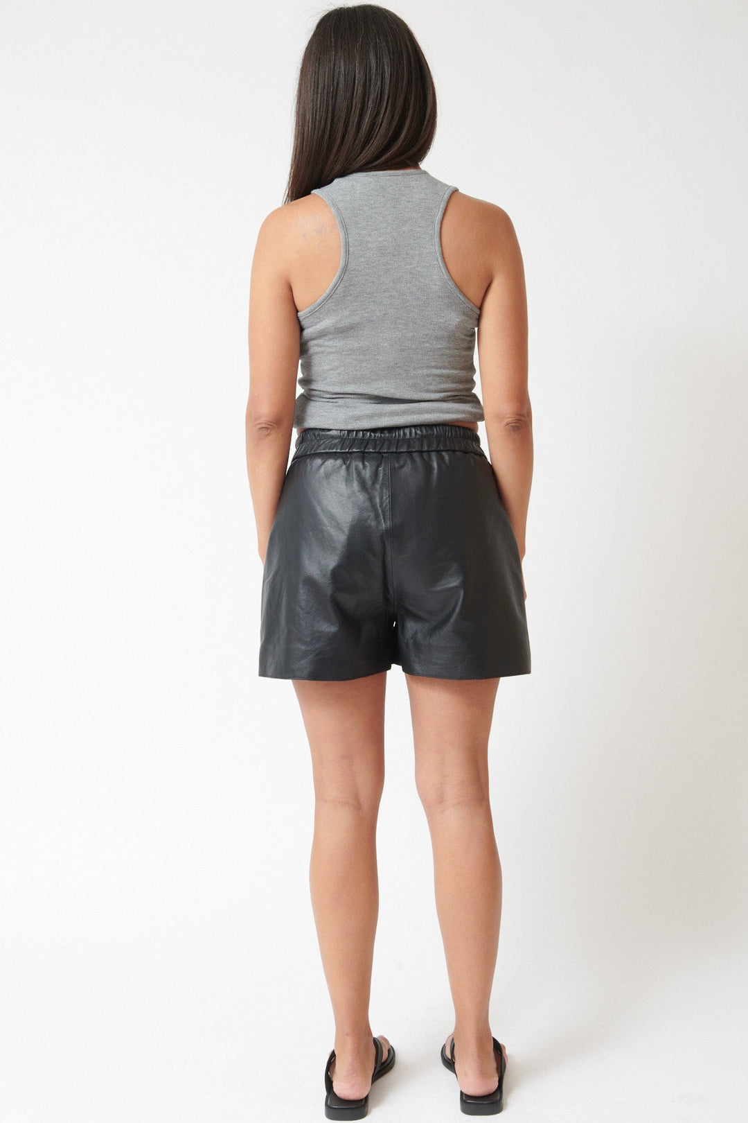 Amanda wearing ATM Anthony Thomas Melillo Leather Pull On Short Black rear view