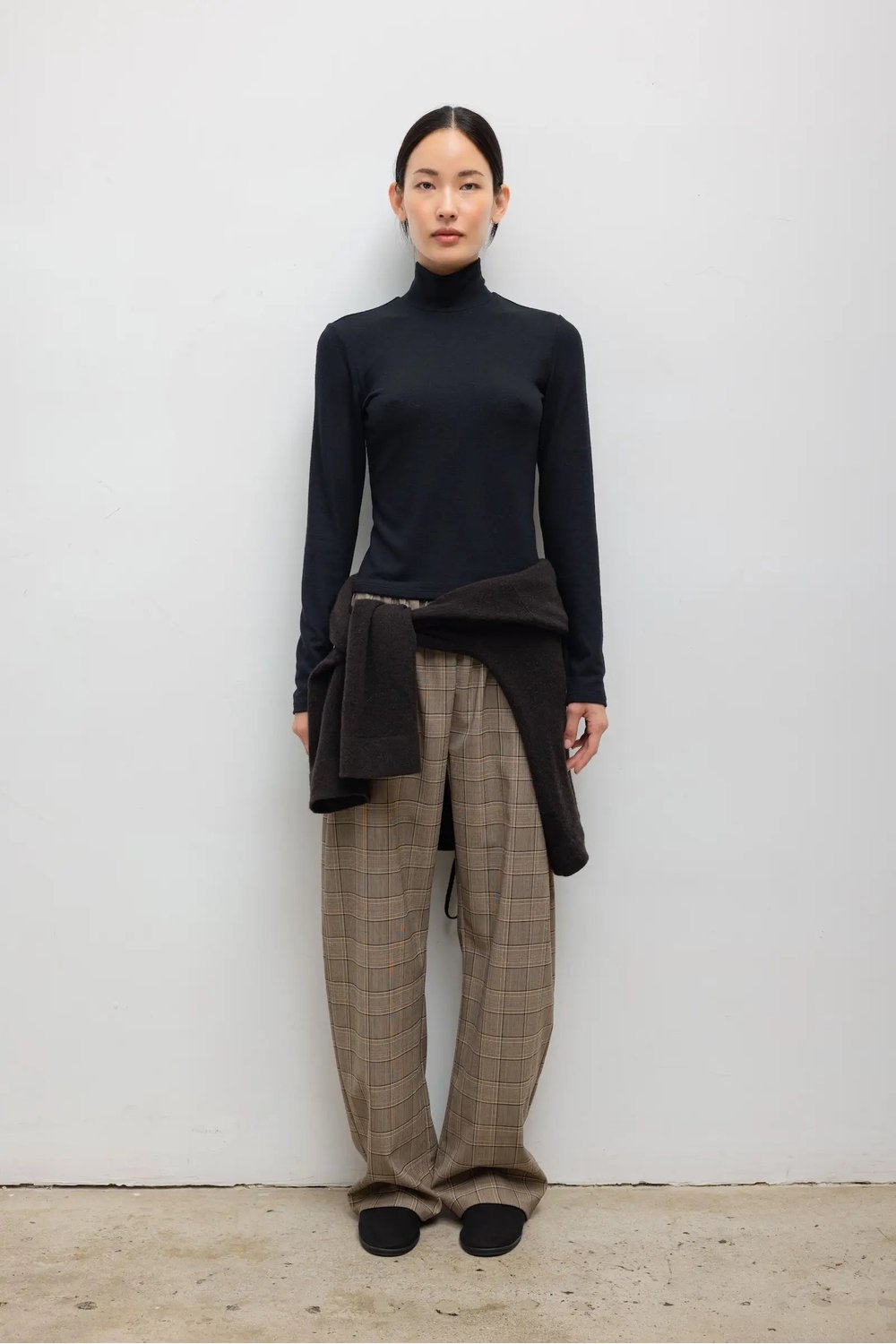 LESET Lauren Long Sleeve Turtleneck in Black, styled on model