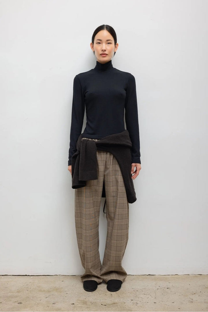 LESET Lauren Long Sleeve Turtleneck in Black, styled on model