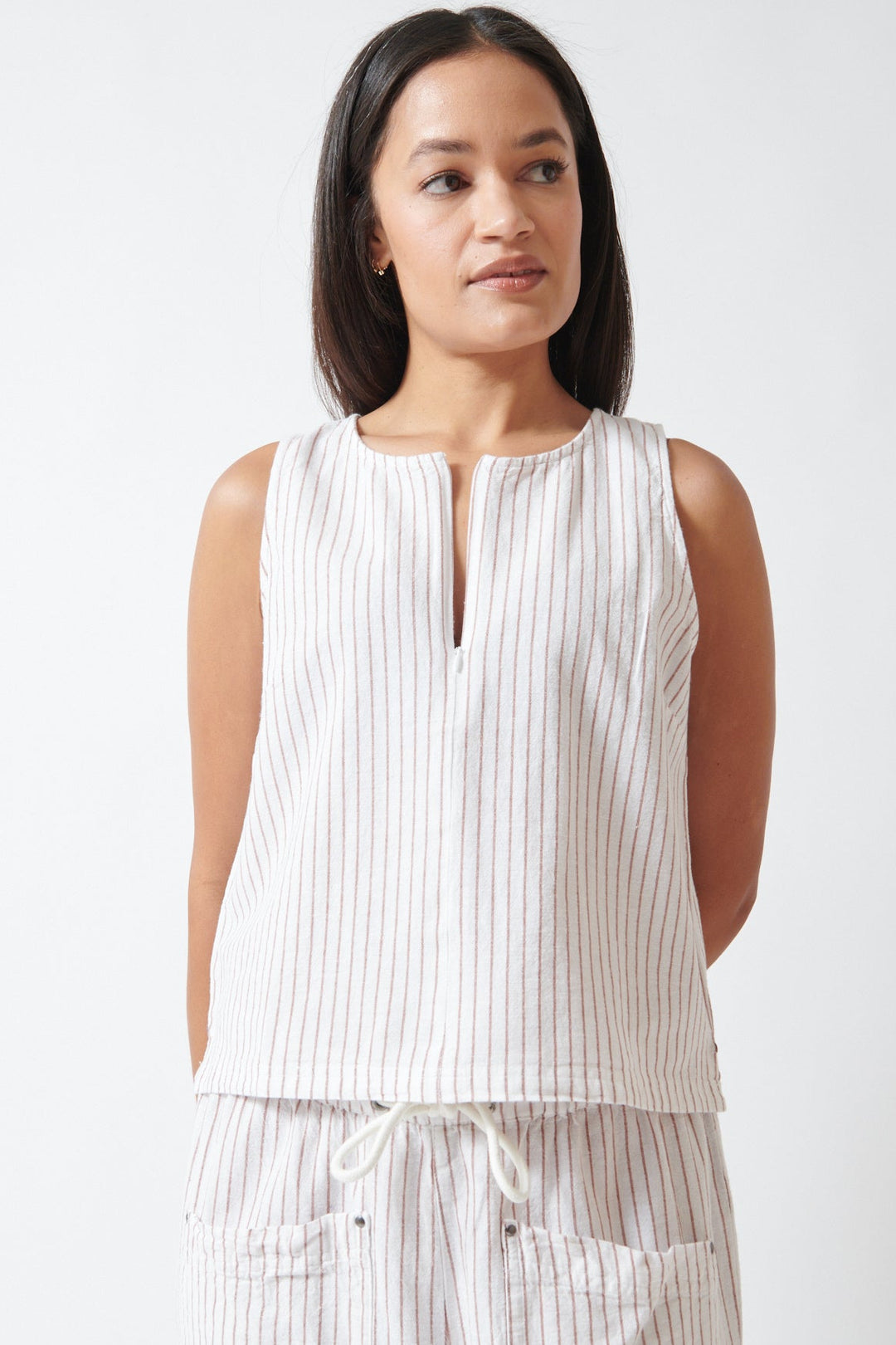 Amanda wearing Lilla P Sleeveless Zip Top front view