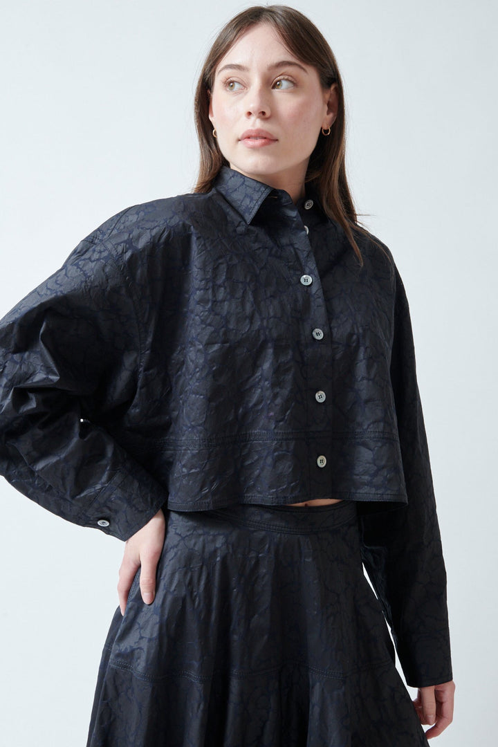 Angela wearing Mantu Janice Crop Blouse Chocolate Over Navy front view