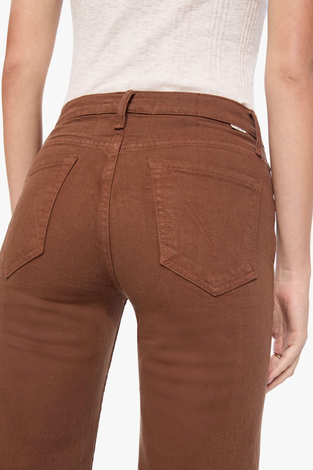 Model wearing Mother Denim The Kick It front detail view