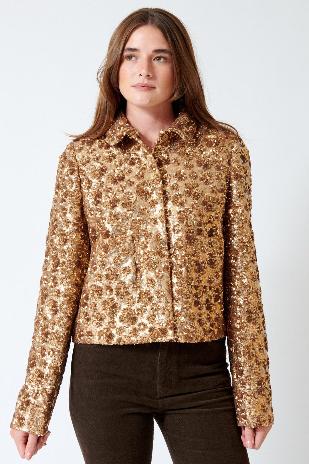 Julia wearing N°21 Supreme Golden Gal Jacket in Gold Coin, front view.