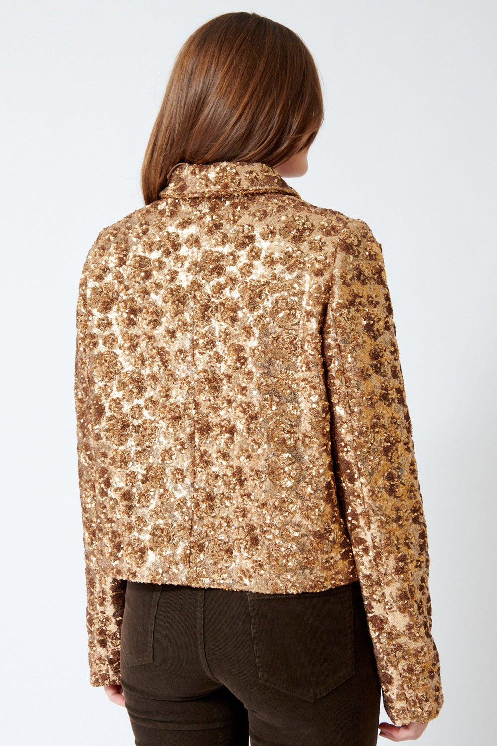 Julia wearing N°21 Supreme Golden Gal Jacket in Gold Coin, front view.