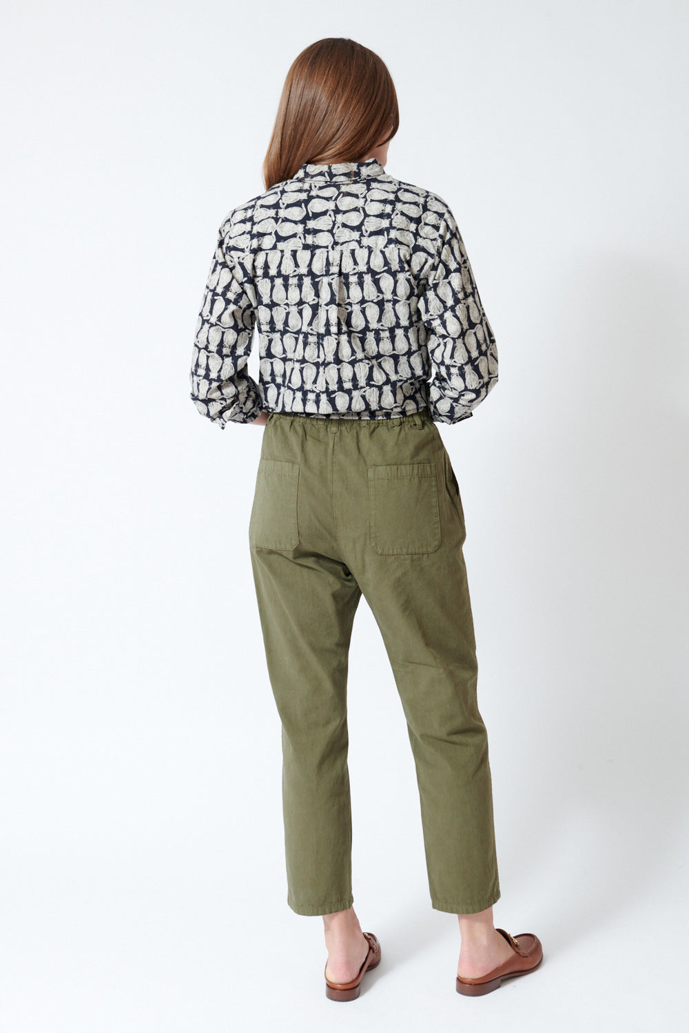 Julia waring Pas de Calais Cotton Grosgrain Tapered Pants in Khaki, rear view.