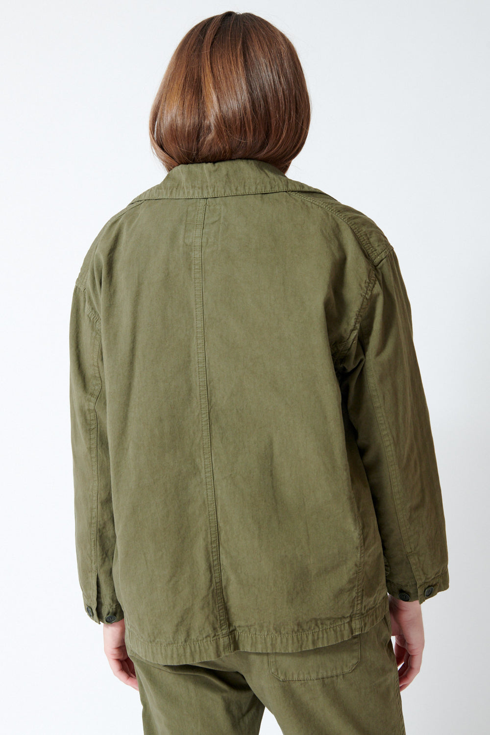 Julia wearing Pas de Calais Cotton Cotton Grosgrain Hunting Jacket in Khaki, rear view.