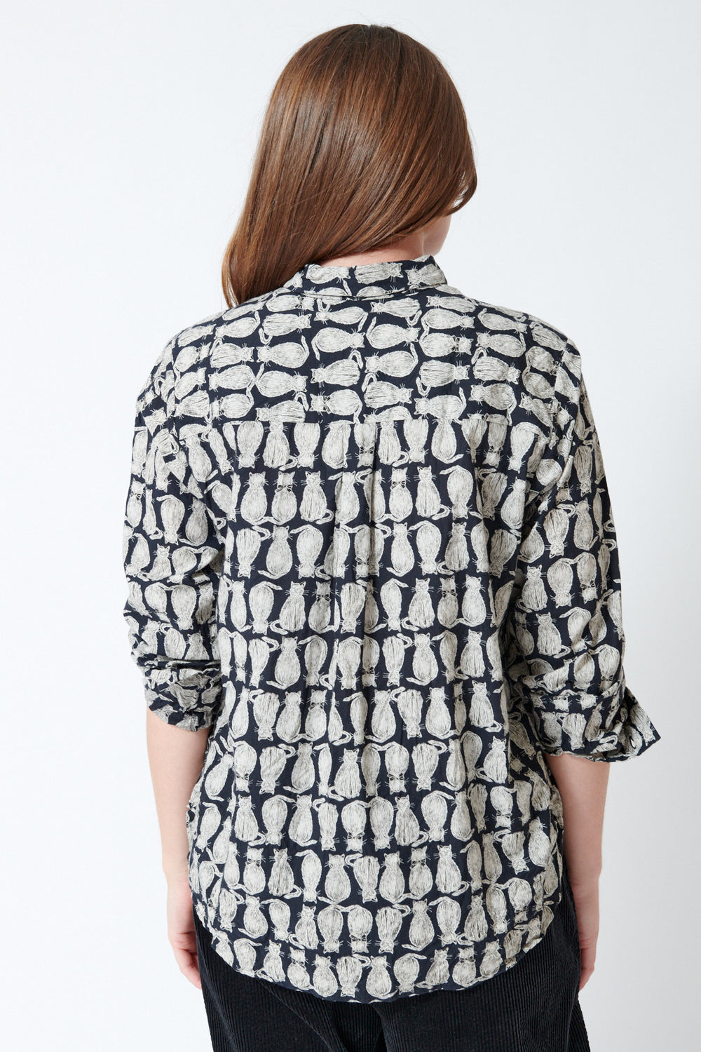 Julia wearing Pas de Calais Cat Patrol Print Shirt, rear view.
