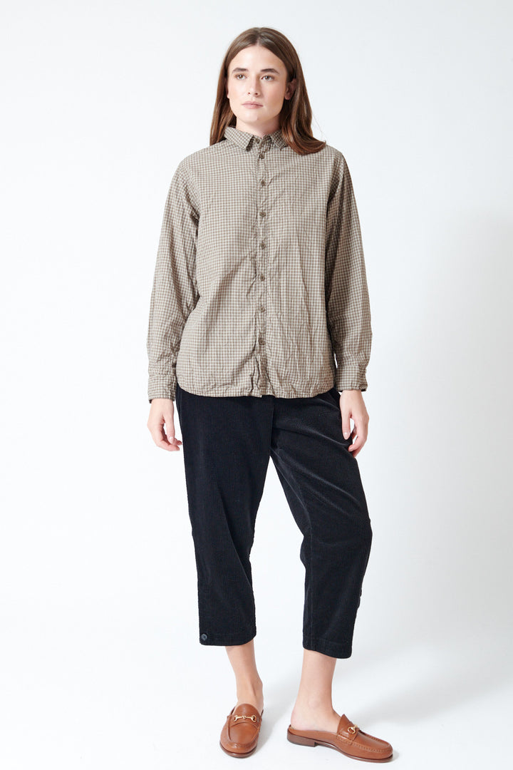 Julia wearing Pas de Calais Corduroy Tapered Pants in Black, front view.