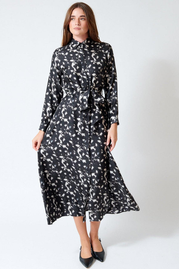 Julia wearing Rosso 35 Belted Button Down Silk Dress in Chalkboard, front view.