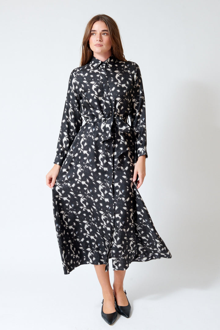 Julia wearing Rosso 35 Belted Button Down Silk Dress in Chalkboard, front view.