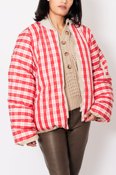 Front of Sofie D'Hoore Origin Reversible Down Filled Cropped Bomber with the Red Plaid side out, on a model