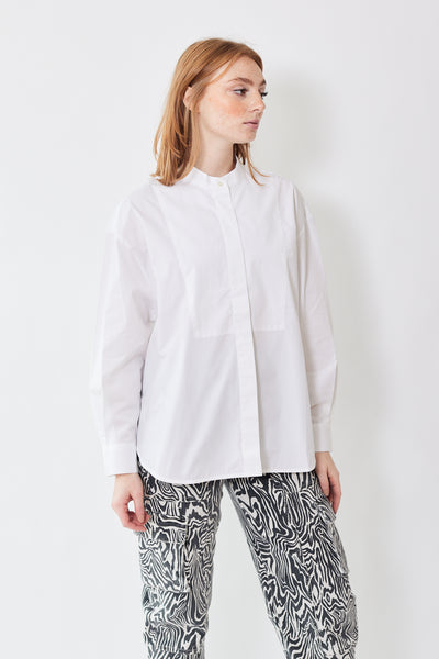 Front of Dianelle Blouse in white on model.