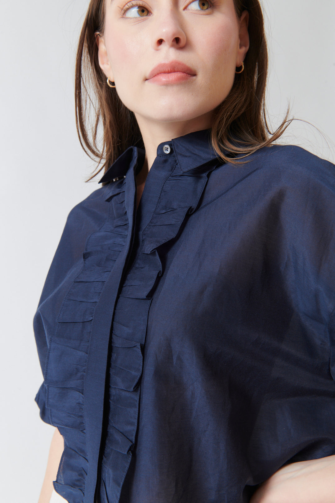Angela wearing TWP Next Ex With Ruffle Shirt Midnight front/detail view