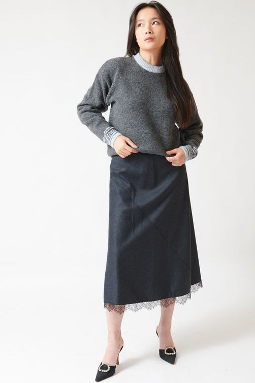 Lilly wearing Tela Tina Skirt front view