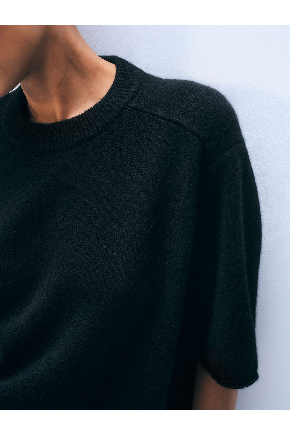 White + Warren Cashmere Oversized Tee in Black, close-up on model