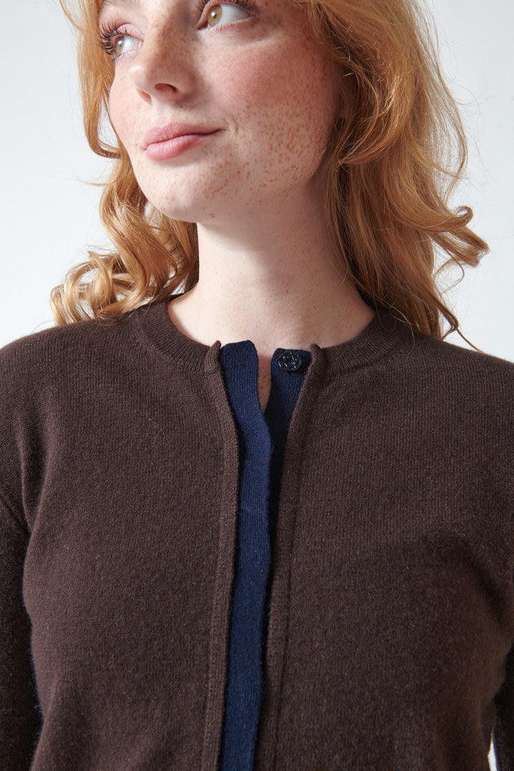 Waverly wearing Jumper 1234 Cashmere Double Trim Cardigan front detail view