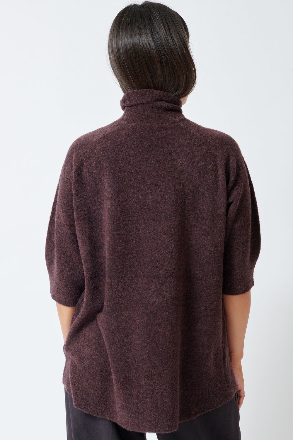 Model wearing Christian Wijnants Kaluhu Sweater rear view